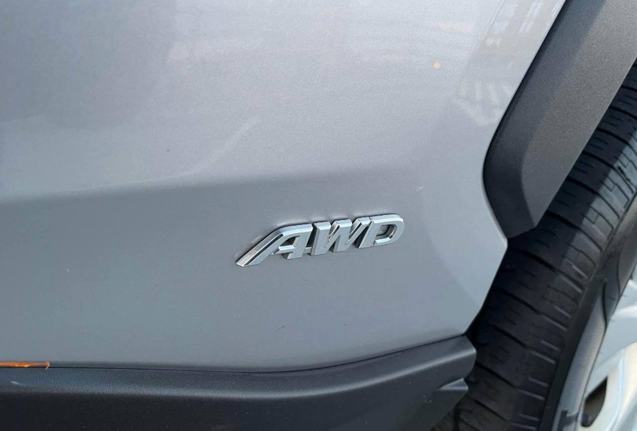 2021 Toyota RAV4 Hybrid • LE Sport Utility 4D