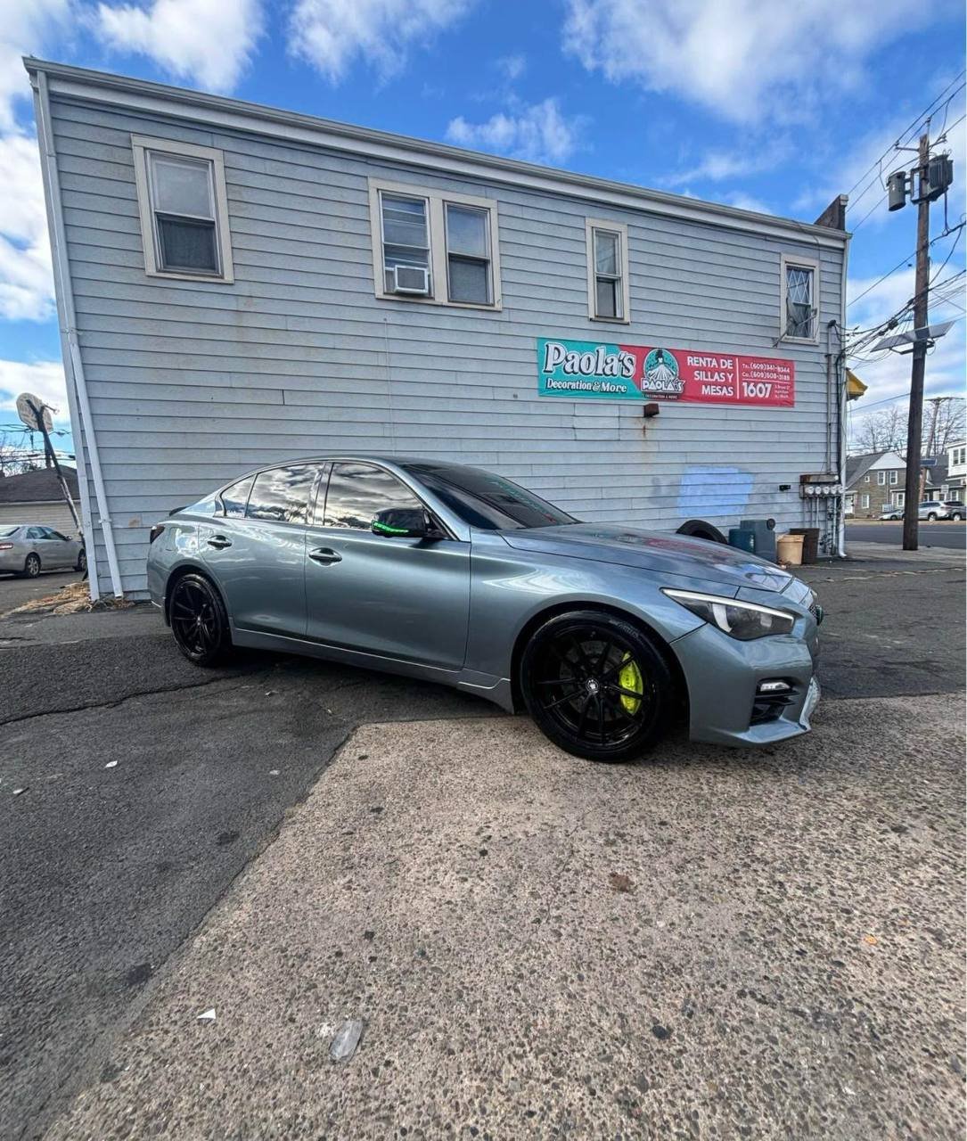 2016 Infiniti Q50 • Red Sport 400 Sedan 4D